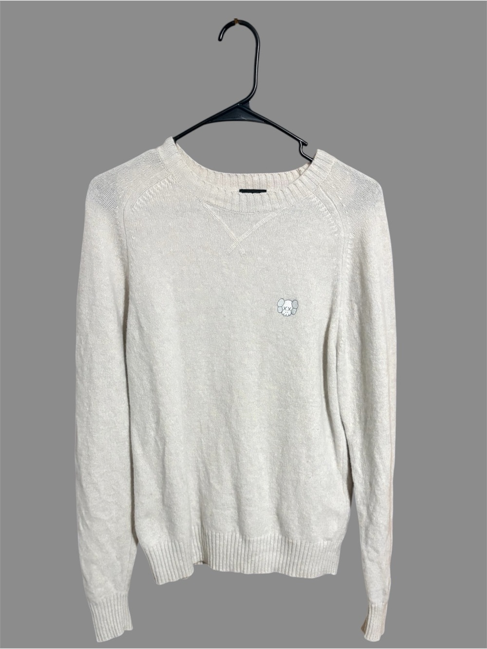 Uniqlo Men's Cream “Lambswool Crewneck Pullover” with Kaws Logo